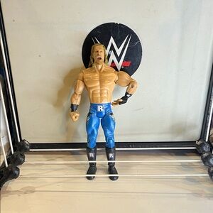 WWE Action Figure with Blue and Black Gear